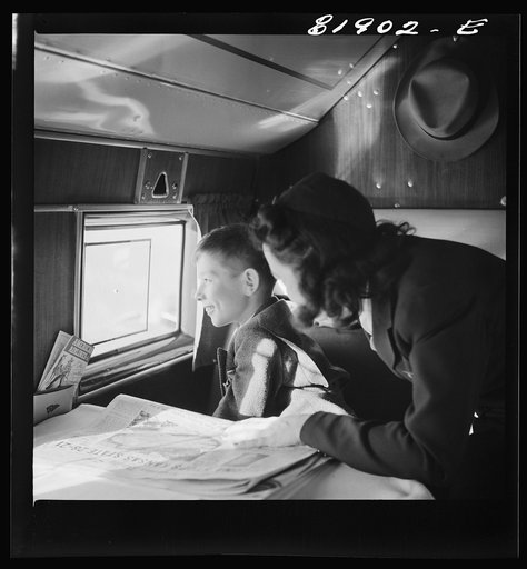 Untitled photo, possibly related to: Passengers aboard an American airliner enroute from Washington to Los Angeles