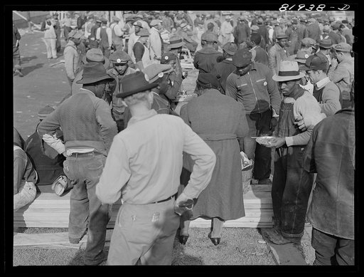 Untitled photo, possibly related to: Lunchtime on emergency defense office housing construction job. Washington, D.C.