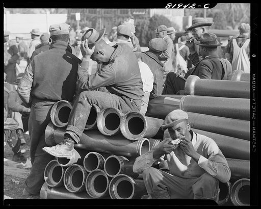 Untitled photo, possibly related to: Washington, D.C. Lunchtime on emergency defense office construction job
