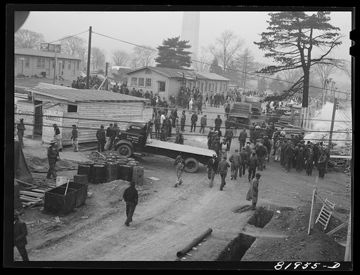 Untitled photo, possibly related to: Eight o'clock whistle, construction gang starting to work on emergency office space, Washington, D.C.