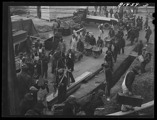 Untitled photo, possibly related to: Eight o'clock whistle, construction gang starting to work on emergency office space, Washington, D.C.
