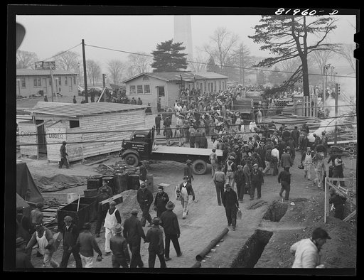 Untitled photo, possibly related to: Eight o'clock whistle, construction gang starting to work on emergency office space, Washington, D.C.