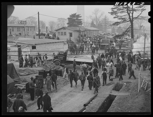 Untitled photo, possibly related to: Eight o'clock whistle, construction gang starting to work on emergency office space, Washington, D.C.