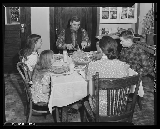 Untitled photo, possibly related to: FSA (Farm Security Administration) client and family sitting down to a well "balanced meal." Calvert County, Maryland