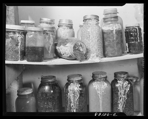 Weak shelf board endangers jars. Calvert County, Maryland
