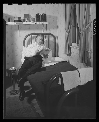 Untitled photo, possibly related to: Washington, D.C. Self-help client in his room in self-help house, where he pays for his room with scrip earned as timekeeper in the self-help exchange