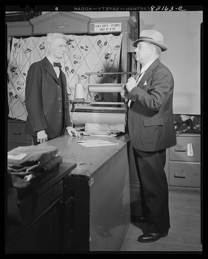 Washington, D.C. Self-help client buying suit with scrip