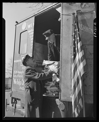 Washington, D.C. Salvage truck unloading in front of self-help exchange