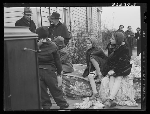 Untitled photo, possibly related to: Lancaster County, Pennsylvania. Amish and Mennonite women at farm auction