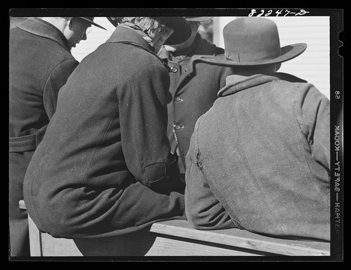 Untitled photo, possibly related to: Lancaster County, Pennsylvania. Mennonite farmers gossiping at farm auction