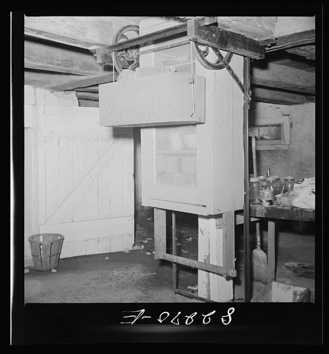 Blue Ball, (vicinity). Lancaster County, Pennsylvania. Dumbwaiter food safe which descends into the basement when not needed. Amish FSA (Farm Security Administration) client's home
