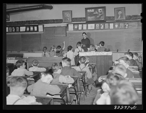 Untitled photo, possibly related to: Hinkletown, Pennsylvania (vicinity). Mennonite teacher holding class in a public school