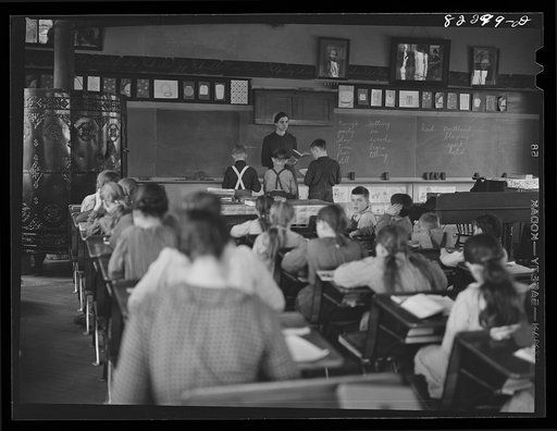 Untitled photo, possibly related to: Hinkletown, Pennsylvania (vicinity). Mennonite teacher holding class in a public school