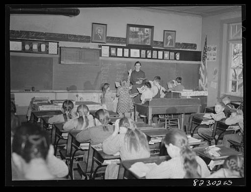 Hinkletown, Pennsylvania (vicinity). Mennonite teacher holding class in a public school