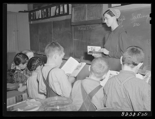 Hinkletown, Pennsylvania (vicinity). Mennonite teacher holding class in one-room, eight grade school house