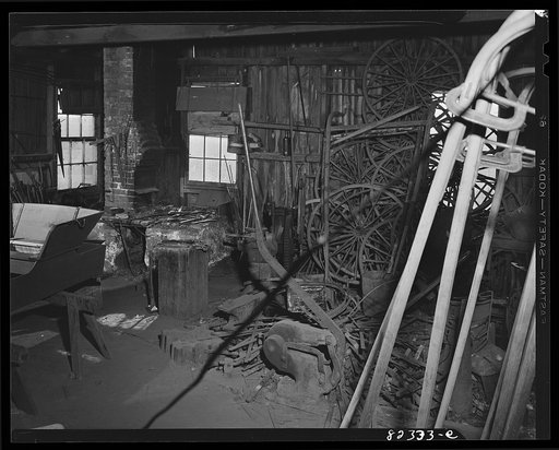 Untitled photo, possibly related to: Intercourse, Pennsylvania (vicinity). Blacksmith shop in conjuction with Amish wagon shop
