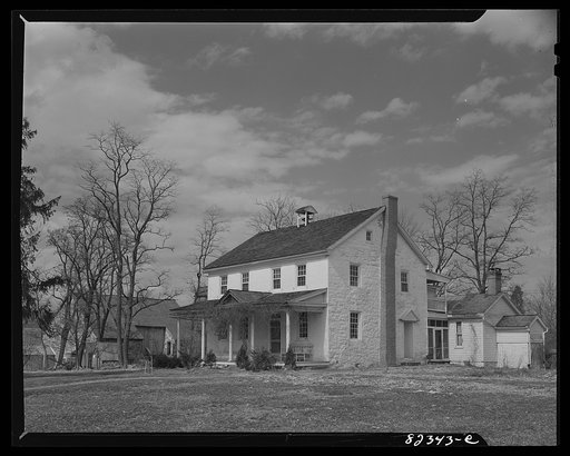 Ephrata, Pennsylvania (vicinity). Fry homestead, which has been in the family for seven generations. Note hex sign by chimney