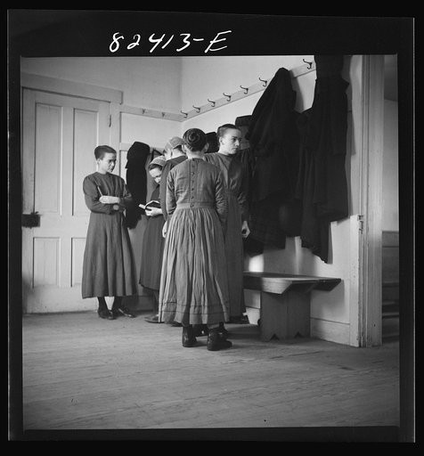 Hinkletown, Pennsylvania (vicinity). Mennonite girls waiting for "Deutsch school" to begin in Mennonite church