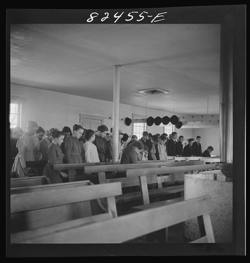 Hinkletown, Pennsylvania. Mennonite children in prayer in a Mennonite church