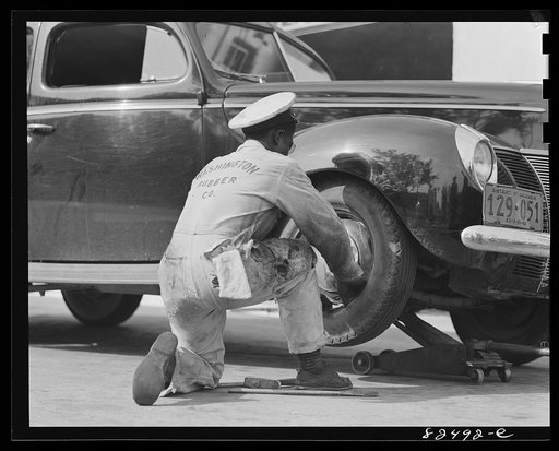 Washington D.C. Changing a tire at a service station