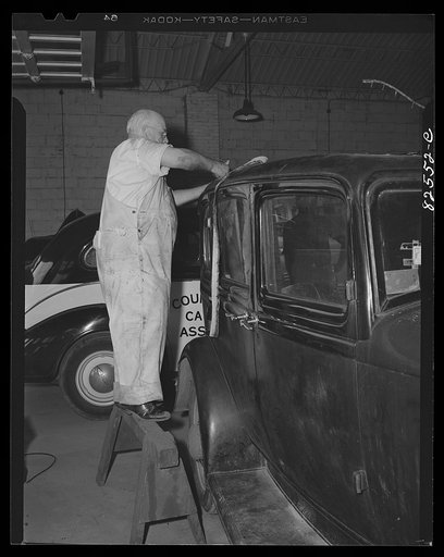 Arlington, Virginia. Installing new top on a used car