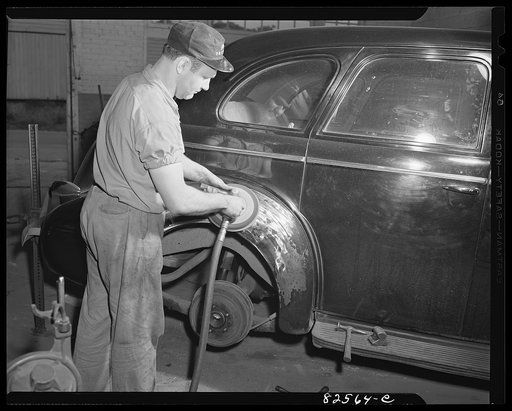 Arlington, Virginia. Buffing surface of car body prior to painting