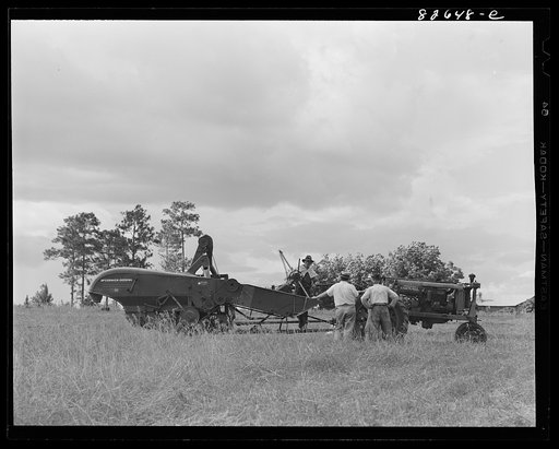 Escambia Farms, Florida. Harvester and combine owned by the cooperative which not only serves the FSA (Farm Security Administration) clients by the rest of the community as well