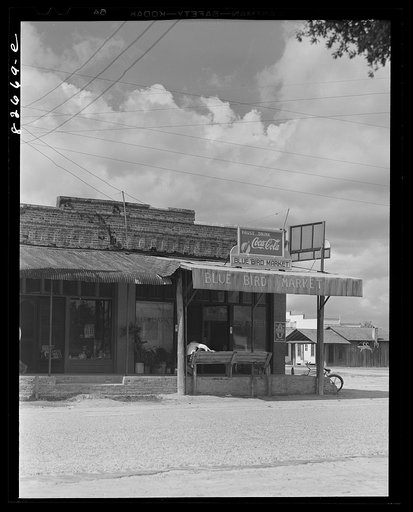 Untitled photo, possibly related to: Baker, Florida. The crossroads. Baker was a big center in the lumbering days. It was on the Falco lumber company rail line, but they tore up the tracks in 1923 and Baker's population began to dwindle