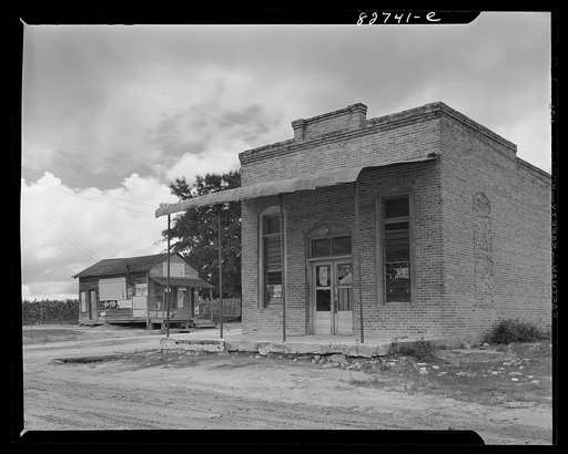 Falco, Florida [i.e. Alabama]. Falco was a thriving, overcrowded town in the twenties. Now most of its buildings have been fired or torn down, so that today it is only a post office and a crossroads