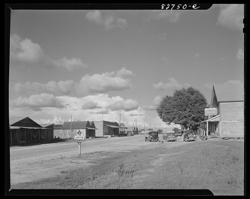 Untitled photo, possibly related to: Baker, Florida. Main street. Once a prosperous town, when lumber was booming, turpentine flowing, and the land still rich for farming. Today it is another forgotten town