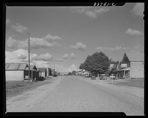 Baker, Florida. Main street. Once a prosperous town, when lumber was booming, turpentine flowing, and the land still rich for farming. Today it is another forgotten town
