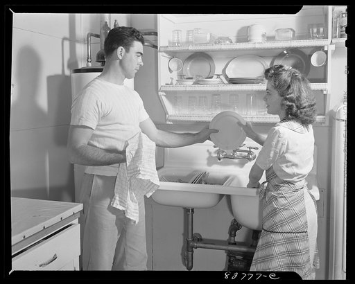 Untitled photo, possibly related to: Childersburg, Alabama. Cousa Court defense housing project. The Smiths share the drudgery of housework, for they both have important war jobs