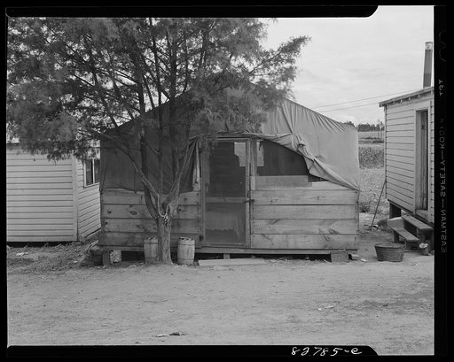 Childersburg, Alabama. Defense workers who could not get in a housing project or buy trailers live in tents or one-room shacks