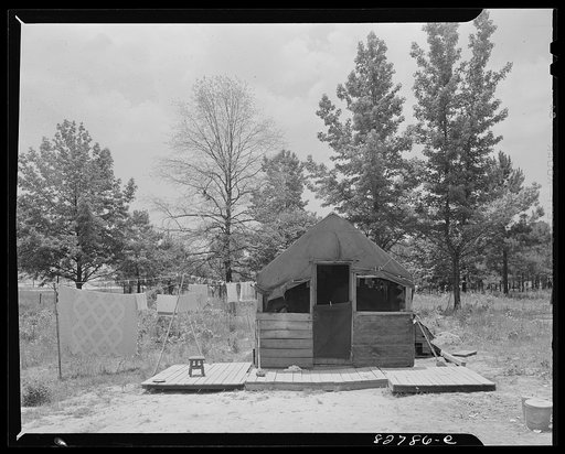 Childersburg, Alabama. Defense workers who could not get in a housing project or buy trailers live in tents or one-room shacks