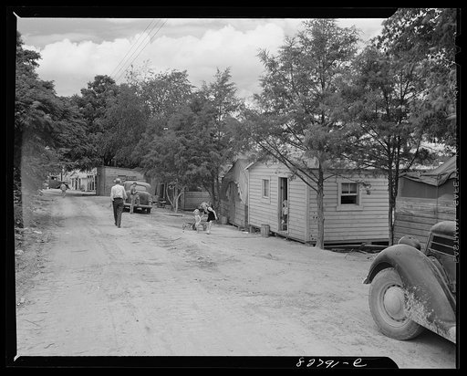 Untitled photo, possibly related to: Childersburg, Alabama. Defense workers who could not get in a housing project or buy trailers live in tents or one-room shacks
