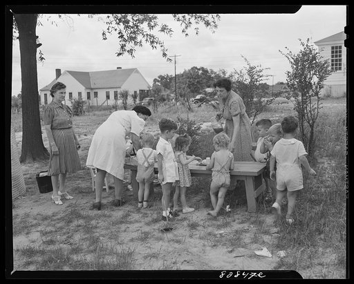 Childersburg, Alabama. Tomato juice is served to the children at 10 a.m. in the WPA (Works Progress Administration) day nursey for defense workers' children