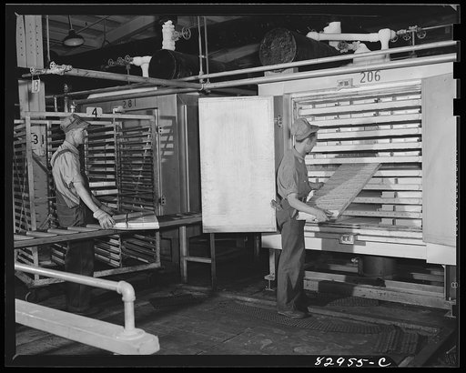 Untitled photo, possibly related to: Bridgeton, New Jersey. Seabrook Farm. Packed string beans being put into quick freezer