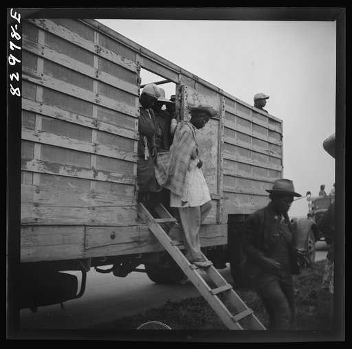 Untitled photo, possibly related to: Bridgeton, New Jersey. FSA (Farm Security Administration) agricultural workers' camp. Migrant leaving camp for the fields at 5:30 a.m.