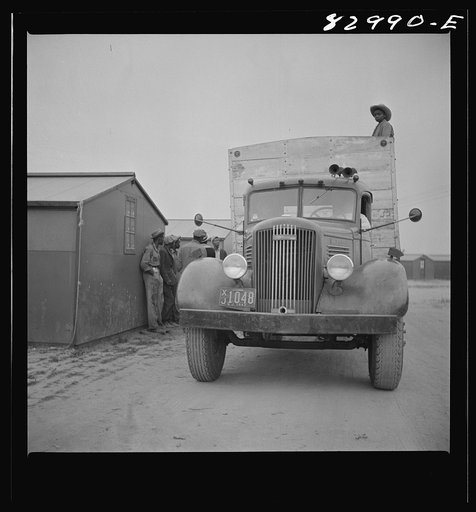 Untitled photo, possibly related to: Bridgeton, New Jersey. FSA (Farm Security Administration) agricultural workers' camp. Migrant leaving camp for the fields at 5:30 a.m.