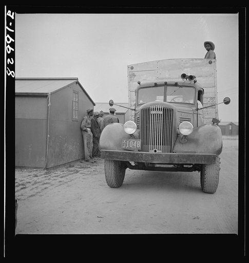 Untitled photo, possibly related to: Bridgeton, New Jersey. FSA (Farm Security Administration) agricultural workers' camp. Migrant leaving camp for the fields at 5:30 a.m.