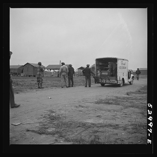Untitled photo, possibly related to: Bridgeton, New Jersey. FSA (Farm Security Administration) agricultural workers' camp. Ice cream trucks make daily trips through the camp