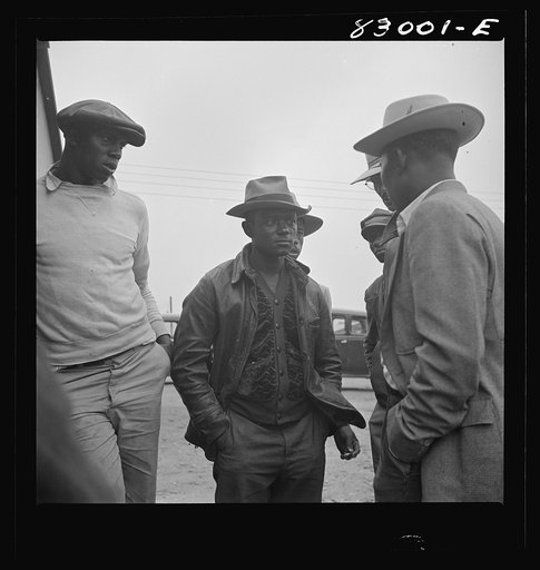 Bridgeton, New Jersey. FSA (Farm Security Administration) agricultural workers' camp. Talking things over