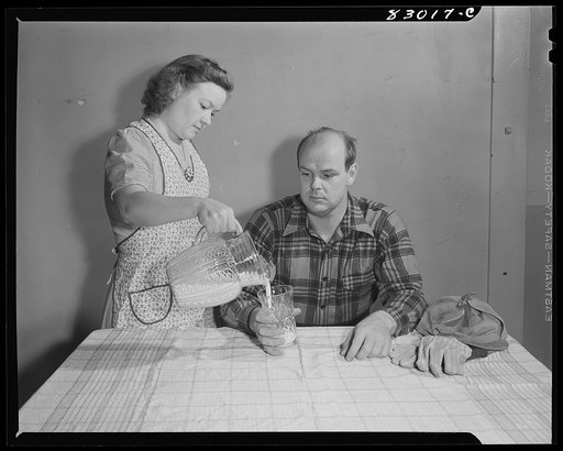 Bridgeton, New Jersey. Seabrook Farm. Man drinking milk