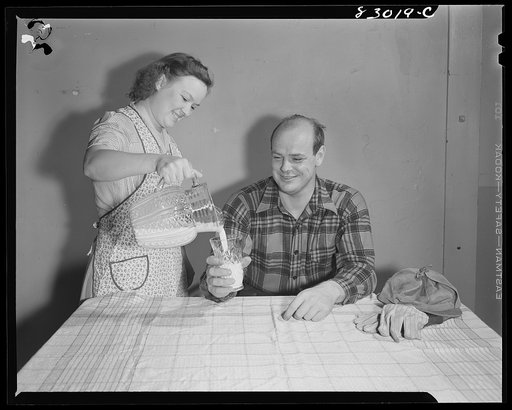 Bridgeton, New Jersey. Seabrook Farm. Man drinking milk