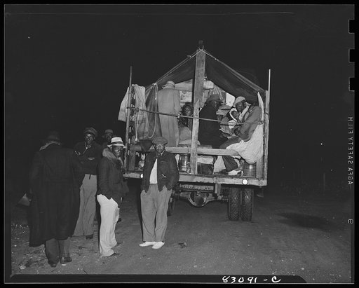 Untitled photo, possibly related to: Bridgeton, New Jersey. FSA (Farm Security Administration) agricultural workers' camp. This truckload of Florida migrants had been on the way three days and three nights. It was raining much of the time, and one woman contracted pleurisy. The trip cost each person