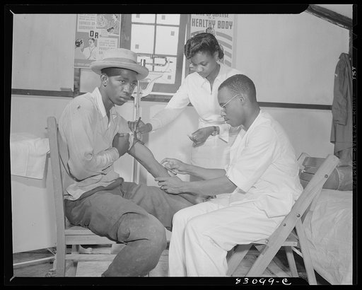 Untitled photo, possibly related to: Bridgeton, New Jersey. FSA (Farm Security Administration) agricultural workers' camp. Taking blood for Wasserman test