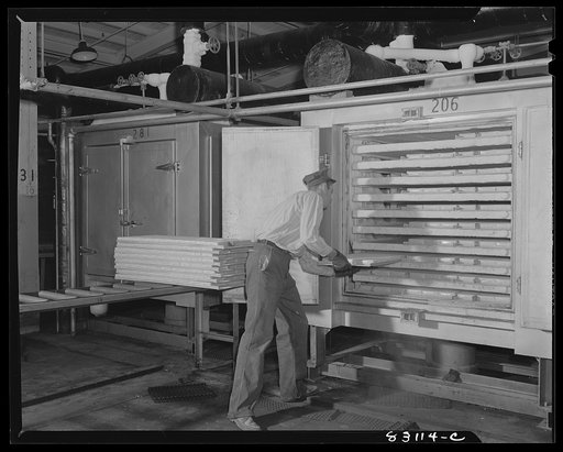 Untitled photo, possibly related to: Bridgeton, New Jersey. Seabrook Farm. Packed string beans being put into quick freezer