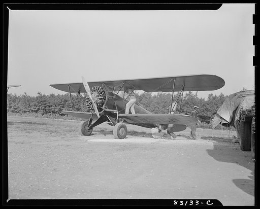 Untitled photo, possibly related to: Bridgeton, New Jersey. Seabrook Farm. Dusting with an airplane. Dust or insecticide is spread by low flying planes onto crops to control various insect pests