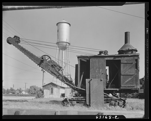 Bridgeton. New Jersey. Seabrook Farm. Steam shovel which stands as a symbol of Seabrook enterprise. Before Seabrook organized the Seabrook Farm, he was an engineer in Russia as well as in the United States