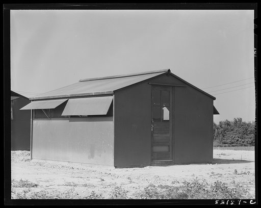 Untitled photo, possibly related to: Bridgeton, New Jersey. FSA (Farm Security Administration) agricultural workers' camp. Pre-fabricated houses, made from materials not affected by wartime shortages, at the camp